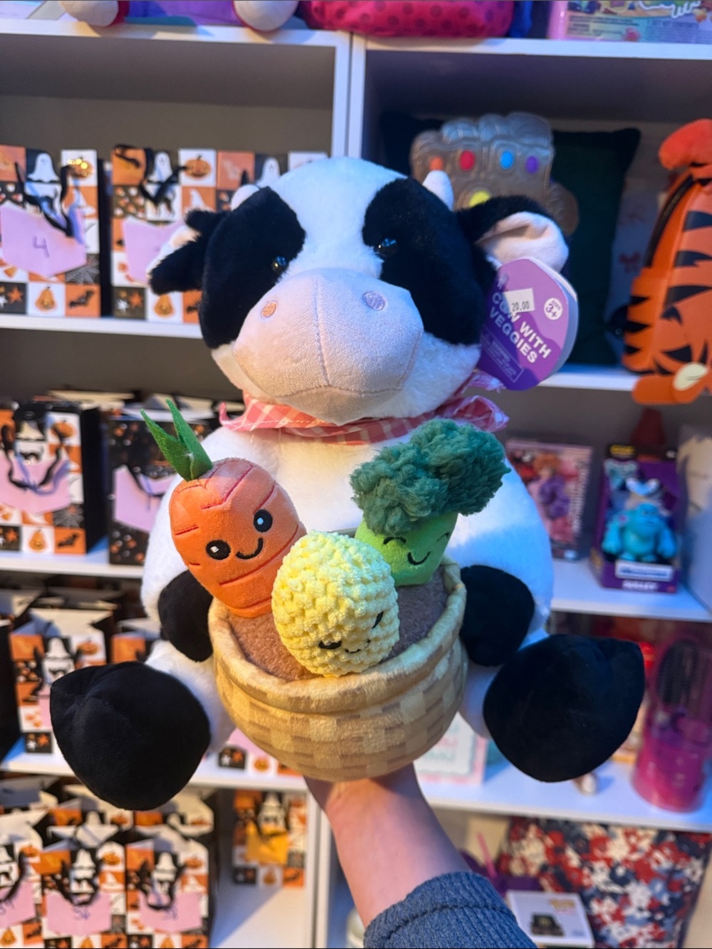 Plush Cow Holding Cute Vegetable Basket – White & Black